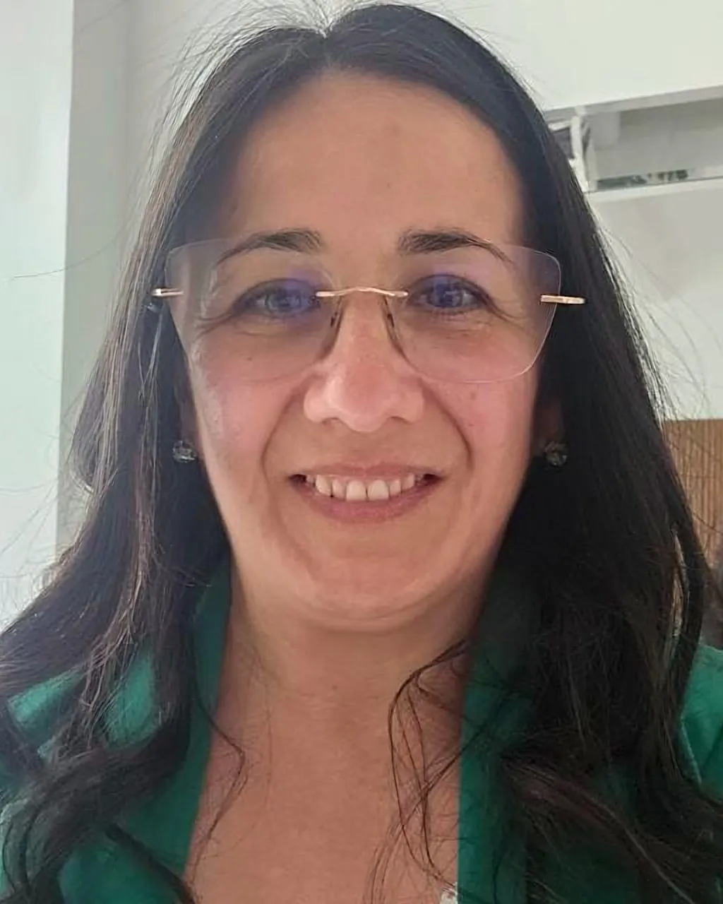 La Dra. Claudia Garín, directrice de l’Estudio Jurídico Integral, souriante